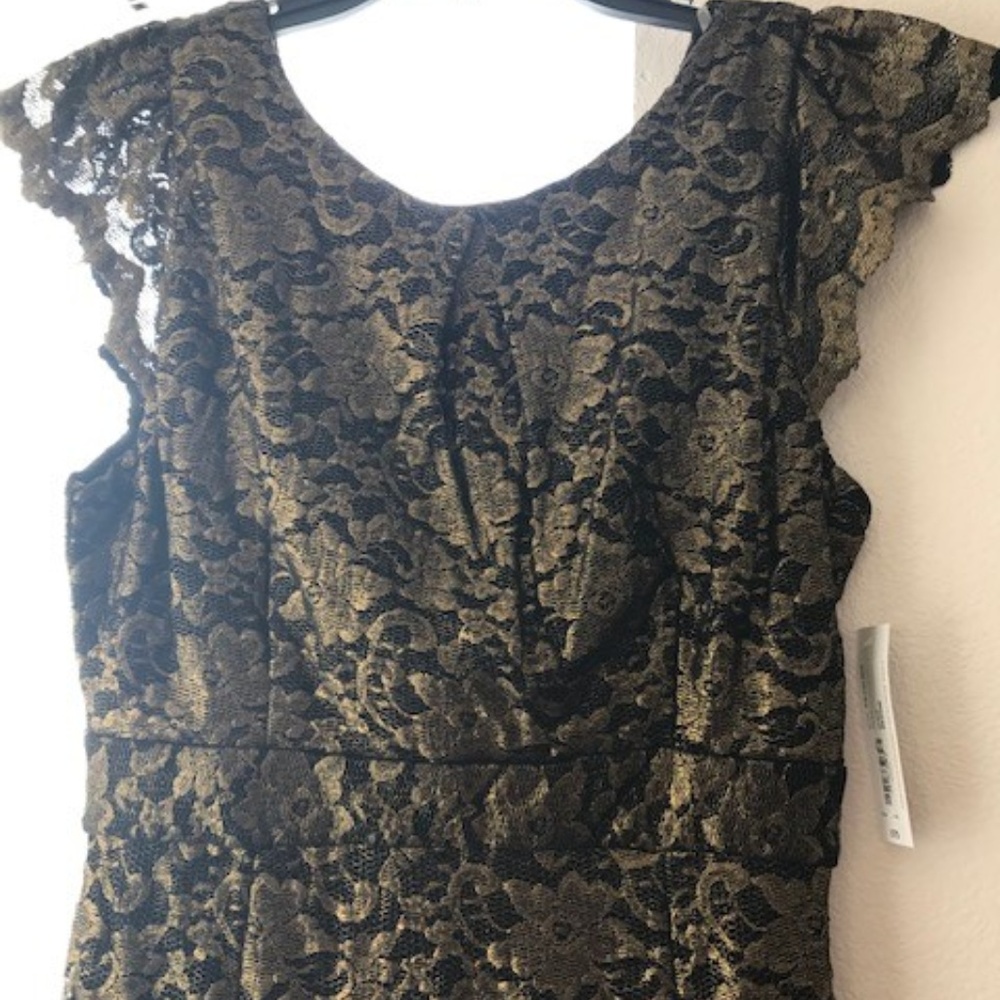 Flattering Black and Gold Lace Dress by Allen B.